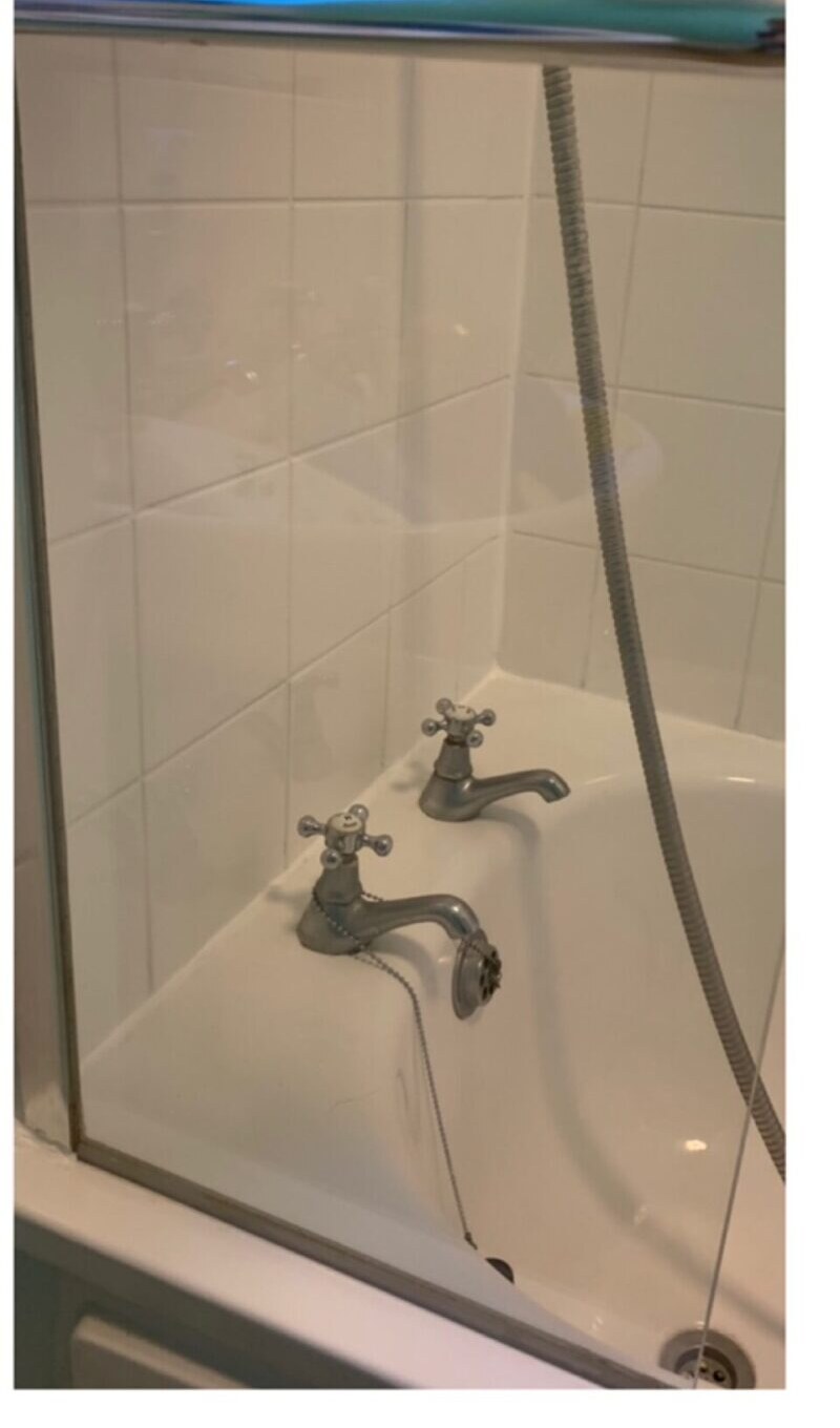 Sparkling clean recoloured grout and bath after GroutGleam Hamilton